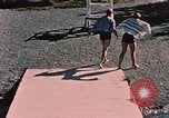 Image of bather Alaska USA, 1954, second 32 stock footage video 65675035048