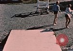 Image of bather Alaska USA, 1954, second 33 stock footage video 65675035048