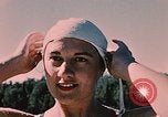 Image of bather Alaska USA, 1954, second 40 stock footage video 65675035048