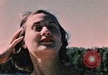 Image of bather Alaska USA, 1954, second 44 stock footage video 65675035048