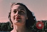 Image of bather Alaska USA, 1954, second 45 stock footage video 65675035048