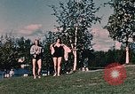 Image of bather Alaska USA, 1954, second 51 stock footage video 65675035048
