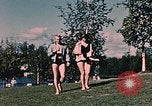 Image of bather Alaska USA, 1954, second 55 stock footage video 65675035048