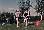 Image of bather Alaska USA, 1954, second 56 stock footage video 65675035048