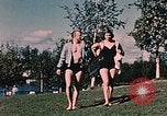 Image of bather Alaska USA, 1954, second 57 stock footage video 65675035048