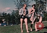 Image of bather Alaska USA, 1954, second 59 stock footage video 65675035048
