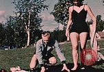 Image of bather Alaska USA, 1954, second 61 stock footage video 65675035048