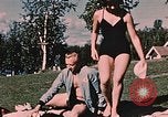 Image of bather Alaska USA, 1954, second 62 stock footage video 65675035048