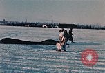 Image of Otter tracked vehicle in snow Alaska USA, 1954, second 39 stock footage video 65675035052