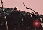 Image of 105mm howitzer gun Fort Richardson Alaska USA, 1954, second 11 stock footage video 65675035053