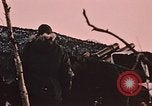 Image of 105mm howitzer gun Fort Richardson Alaska USA, 1954, second 12 stock footage video 65675035053