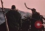 Image of 105mm howitzer gun Fort Richardson Alaska USA, 1954, second 33 stock footage video 65675035053