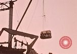 Image of unloading of a ship Whittier Alaska USA, 1954, second 34 stock footage video 65675035060