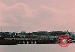 Image of Cranes and buildings near Knik Arm Cook Inlet  Anchorage Alaska USA, 1953, second 3 stock footage video 65675035068