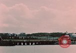 Image of Cranes and buildings near Knik Arm Cook Inlet  Anchorage Alaska USA, 1953, second 4 stock footage video 65675035068