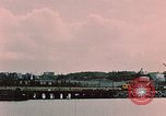 Image of Cranes and buildings near Knik Arm Cook Inlet  Anchorage Alaska USA, 1953, second 5 stock footage video 65675035068