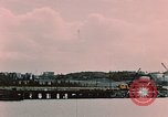 Image of Cranes and buildings near Knik Arm Cook Inlet  Anchorage Alaska USA, 1953, second 6 stock footage video 65675035068