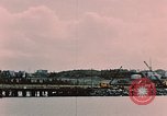 Image of Cranes and buildings near Knik Arm Cook Inlet  Anchorage Alaska USA, 1953, second 10 stock footage video 65675035068