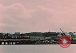 Image of Cranes and buildings near Knik Arm Cook Inlet  Anchorage Alaska USA, 1953, second 13 stock footage video 65675035068
