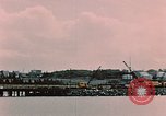 Image of Cranes and buildings near Knik Arm Cook Inlet  Anchorage Alaska USA, 1953, second 15 stock footage video 65675035068