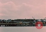 Image of Cranes and buildings near Knik Arm Cook Inlet  Anchorage Alaska USA, 1953, second 17 stock footage video 65675035068