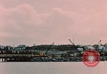 Image of Cranes and buildings near Knik Arm Cook Inlet  Anchorage Alaska USA, 1953, second 20 stock footage video 65675035068