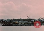Image of Cranes and buildings near Knik Arm Cook Inlet  Anchorage Alaska USA, 1953, second 21 stock footage video 65675035068