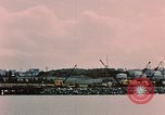 Image of Cranes and buildings near Knik Arm Cook Inlet  Anchorage Alaska USA, 1953, second 22 stock footage video 65675035068