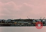 Image of Cranes and buildings near Knik Arm Cook Inlet  Anchorage Alaska USA, 1953, second 23 stock footage video 65675035068