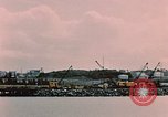 Image of Cranes and buildings near Knik Arm Cook Inlet  Anchorage Alaska USA, 1953, second 24 stock footage video 65675035068