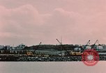 Image of Cranes and buildings near Knik Arm Cook Inlet  Anchorage Alaska USA, 1953, second 26 stock footage video 65675035068