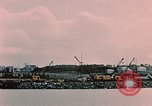 Image of Cranes and buildings near Knik Arm Cook Inlet  Anchorage Alaska USA, 1953, second 28 stock footage video 65675035068