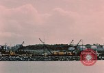 Image of Cranes and buildings near Knik Arm Cook Inlet  Anchorage Alaska USA, 1953, second 33 stock footage video 65675035068