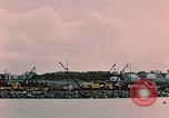 Image of Cranes and buildings near Knik Arm Cook Inlet  Anchorage Alaska USA, 1953, second 34 stock footage video 65675035068