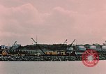 Image of Cranes and buildings near Knik Arm Cook Inlet  Anchorage Alaska USA, 1953, second 36 stock footage video 65675035068