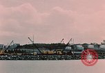 Image of Cranes and buildings near Knik Arm Cook Inlet  Anchorage Alaska USA, 1953, second 37 stock footage video 65675035068