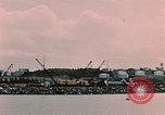 Image of Cranes and buildings near Knik Arm Cook Inlet  Anchorage Alaska USA, 1953, second 39 stock footage video 65675035068