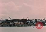 Image of Cranes and buildings near Knik Arm Cook Inlet  Anchorage Alaska USA, 1953, second 40 stock footage video 65675035068