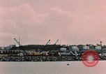 Image of Cranes and buildings near Knik Arm Cook Inlet  Anchorage Alaska USA, 1953, second 42 stock footage video 65675035068
