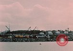 Image of Cranes and buildings near Knik Arm Cook Inlet  Anchorage Alaska USA, 1953, second 44 stock footage video 65675035068