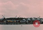 Image of Cranes and buildings near Knik Arm Cook Inlet  Anchorage Alaska USA, 1953, second 45 stock footage video 65675035068