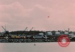 Image of Cranes and buildings near Knik Arm Cook Inlet  Anchorage Alaska USA, 1953, second 46 stock footage video 65675035068