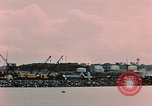 Image of Cranes and buildings near Knik Arm Cook Inlet  Anchorage Alaska USA, 1953, second 47 stock footage video 65675035068