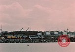 Image of Cranes and buildings near Knik Arm Cook Inlet  Anchorage Alaska USA, 1953, second 48 stock footage video 65675035068