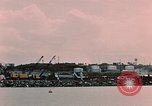 Image of Cranes and buildings near Knik Arm Cook Inlet  Anchorage Alaska USA, 1953, second 49 stock footage video 65675035068