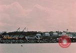 Image of Cranes and buildings near Knik Arm Cook Inlet  Anchorage Alaska USA, 1953, second 50 stock footage video 65675035068