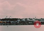 Image of Cranes and buildings near Knik Arm Cook Inlet  Anchorage Alaska USA, 1953, second 51 stock footage video 65675035068
