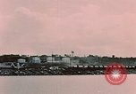 Image of Cranes and buildings near Knik Arm Cook Inlet  Anchorage Alaska USA, 1953, second 52 stock footage video 65675035068