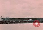Image of Cranes and buildings near Knik Arm Cook Inlet  Anchorage Alaska USA, 1953, second 54 stock footage video 65675035068