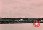 Image of Cranes and buildings near Knik Arm Cook Inlet  Anchorage Alaska USA, 1953, second 55 stock footage video 65675035068